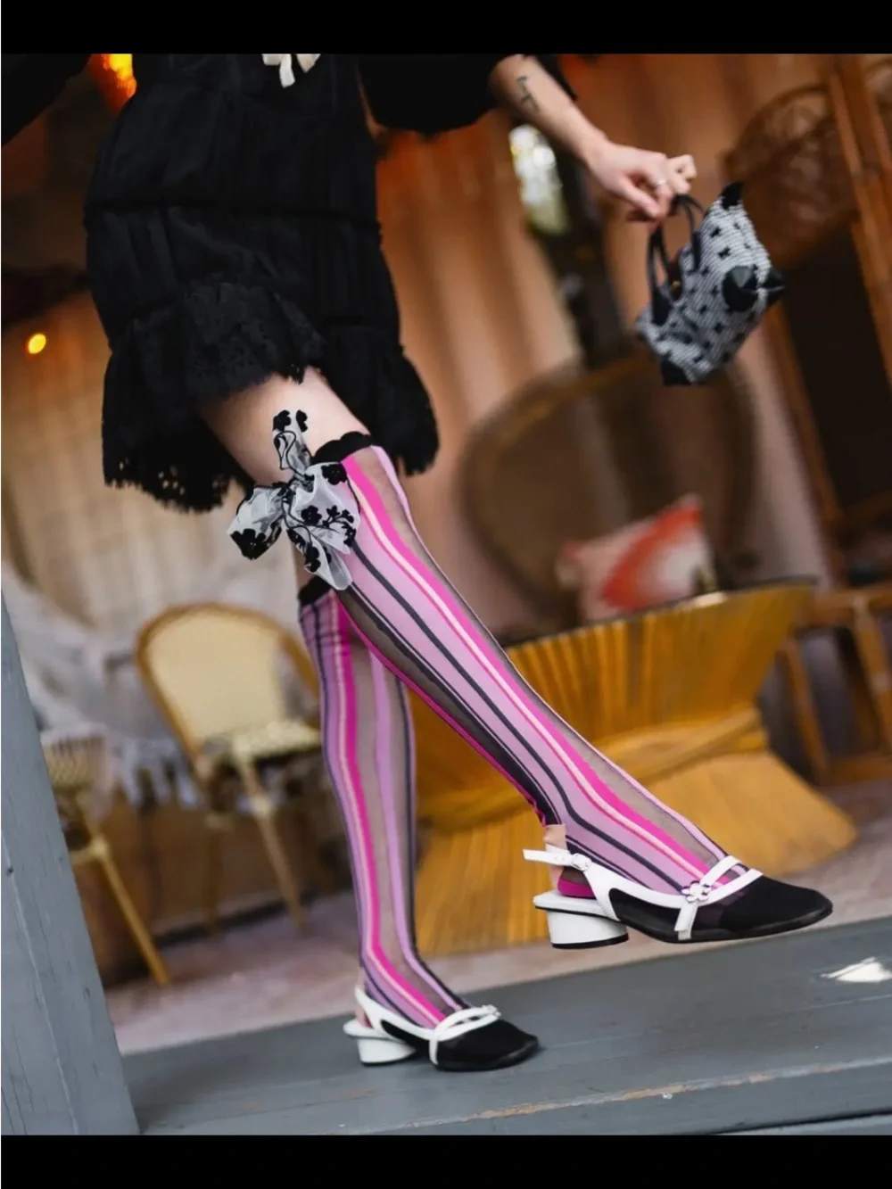 Sock Candy Parision Pink Striped Knee-High Socks with Floral Bow Accent.